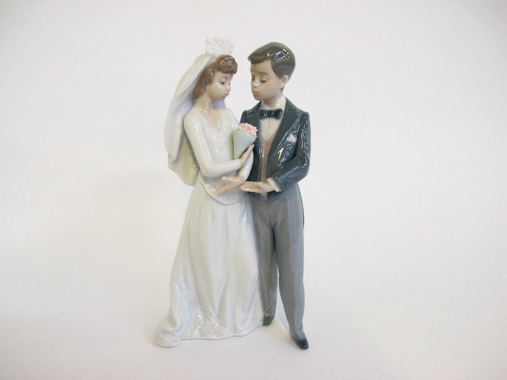 Appraisal: Lladro group of a bride and groom from this day