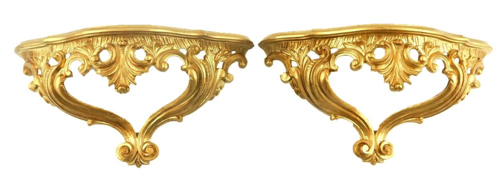 Appraisal: Pair of Italian gilt scroll shelves th C inscribed Italy