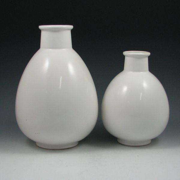 Appraisal: Two Sommerhuber Austrian pottery vases in white gloss Marked with