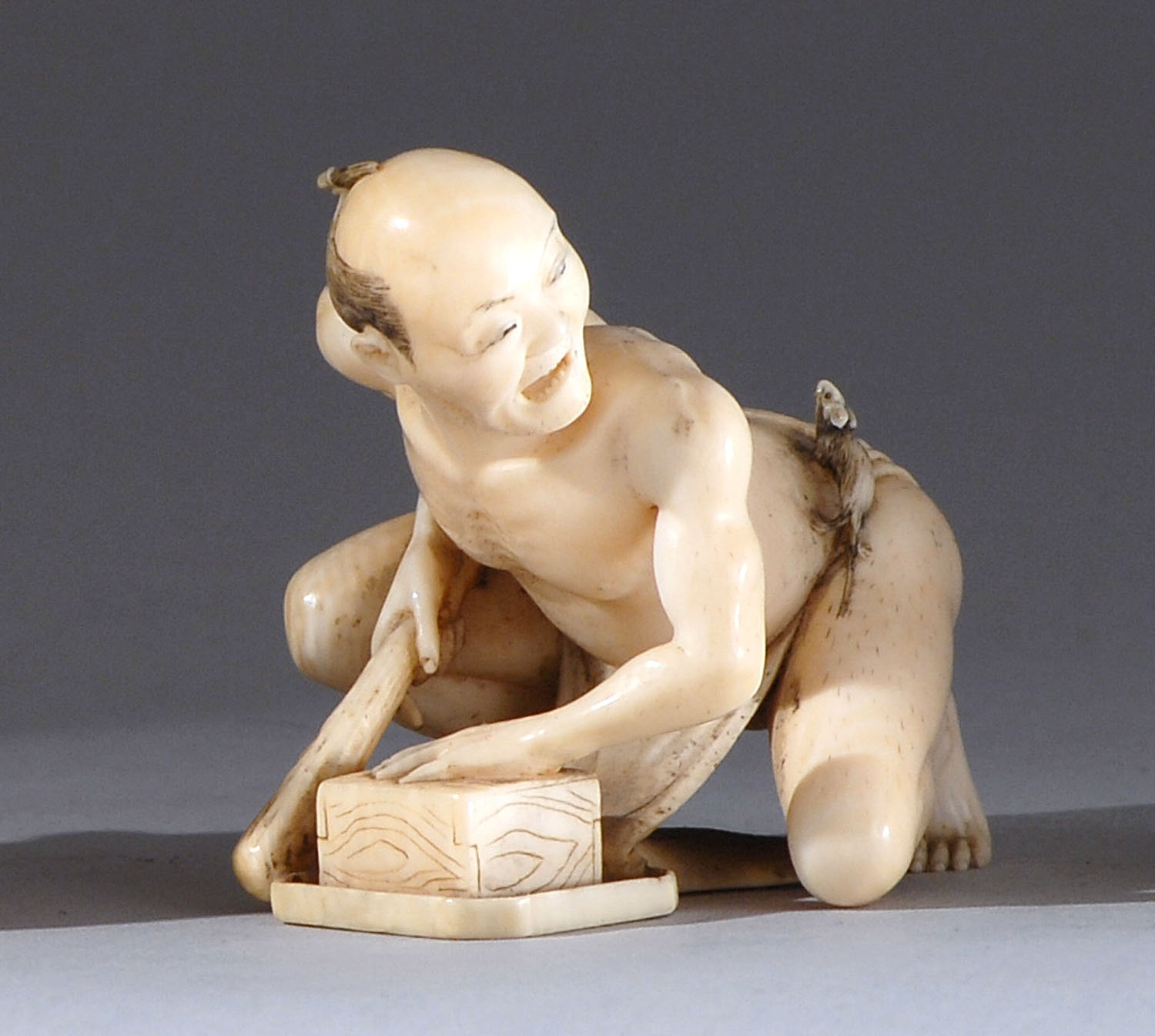 Appraisal: IVORY NETSUKE OKIMONO th CenturyBy Muneshige Depicting a grimmacing rat