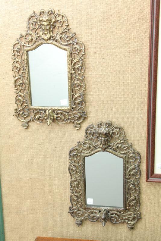 Appraisal: PAIR OF MATCHING MIRRORS Cast brass hanging frames with acanthus