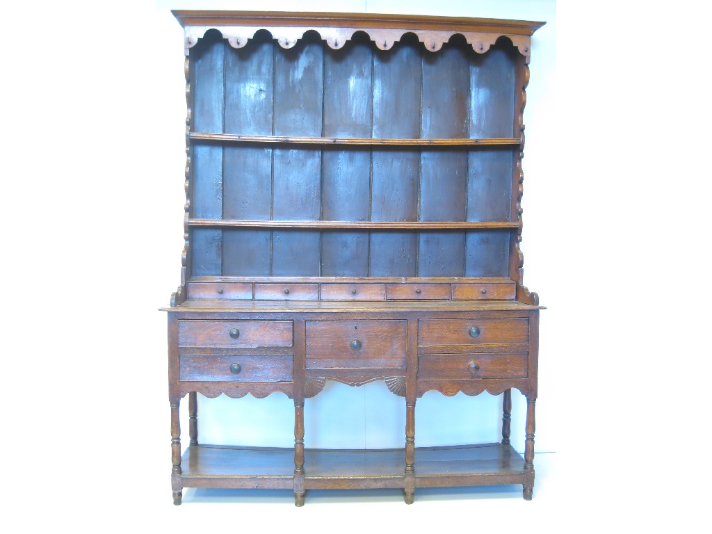 Appraisal: An early th Century oak Dresser with boarded rack having