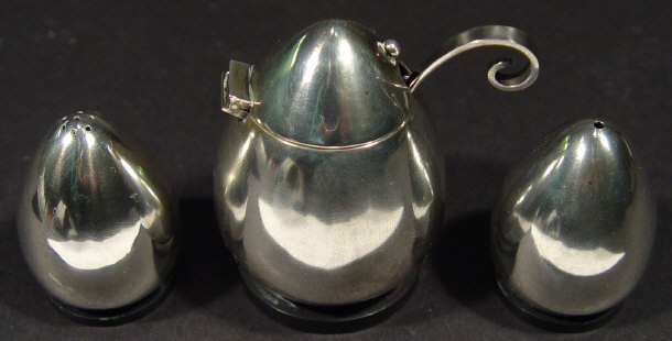 Appraisal: Danish sterling silver three piece condiment set and spoon designed