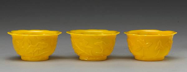 Appraisal: A group of three small yellow Peking glass bowls Republic