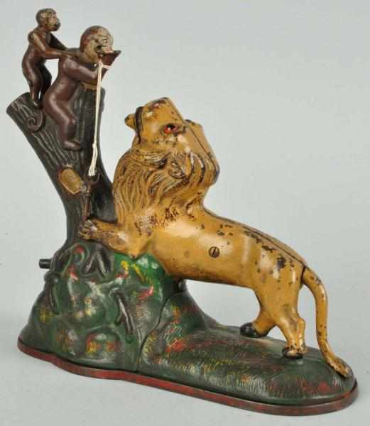 Appraisal: Cast Iron Lion Monkeys Mechanical Bank Description Manufactured by Kyser