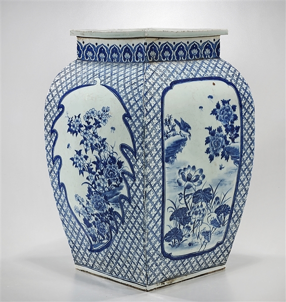 Appraisal: Large Chinese blue and white porcelain four-faceted vase with flower