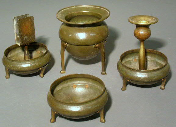 Appraisal: Arts Crafts hammered brass smoking set c largest piece h