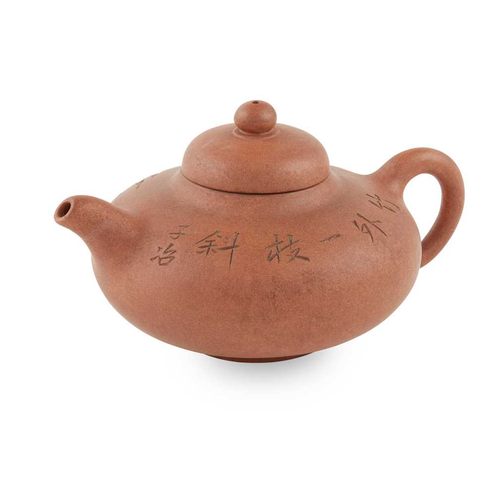 Appraisal: YIXING STONEWARE TEAPOT of compressed globular form carved on the