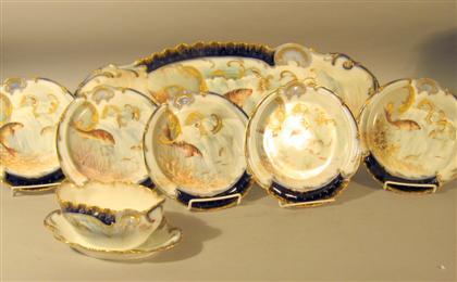 Appraisal: Limoges cobalt and gilt porcelain fish service early th century