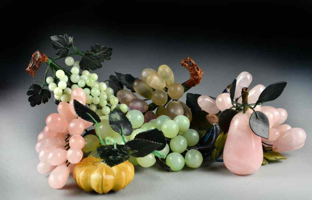 Appraisal: Pieces Jade and Hardstone FruitIncluding fluorite grapes rose quartz pear