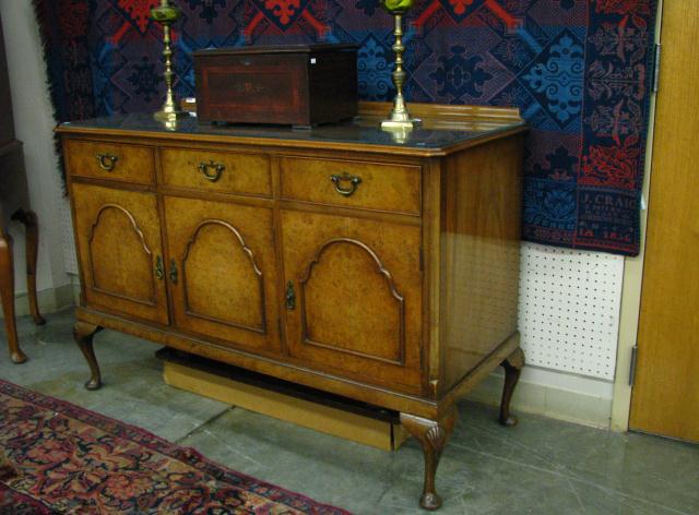 Appraisal: Antique Chippendale style walnut sideboard three drawers over three doors