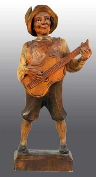 Appraisal: Wooden Hand Carved Whistler Figure Description Probably German Depicts a