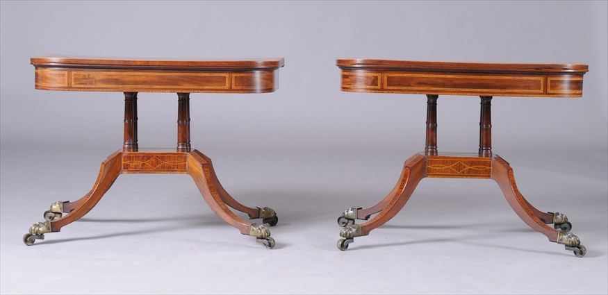 Appraisal: PAIR OF REGENCY SATINWOOD-INLAID MAHOGANY GAMES TABLES Each swivel and