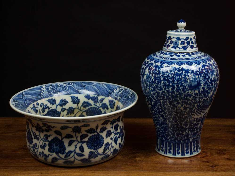 Appraisal: TWO CHINESE QING PORCELAIN BLUE AND WHITE VESSELS lidded urn