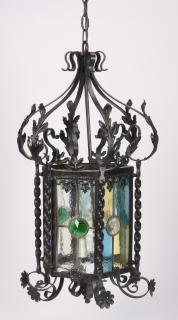 Appraisal: Wrought iron hanging lantern w stained glass h Wrought iron