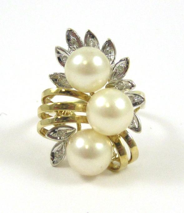 Appraisal: PEARL DIAMOND AND FOURTEEN KARAT GOLD RING The yellow and