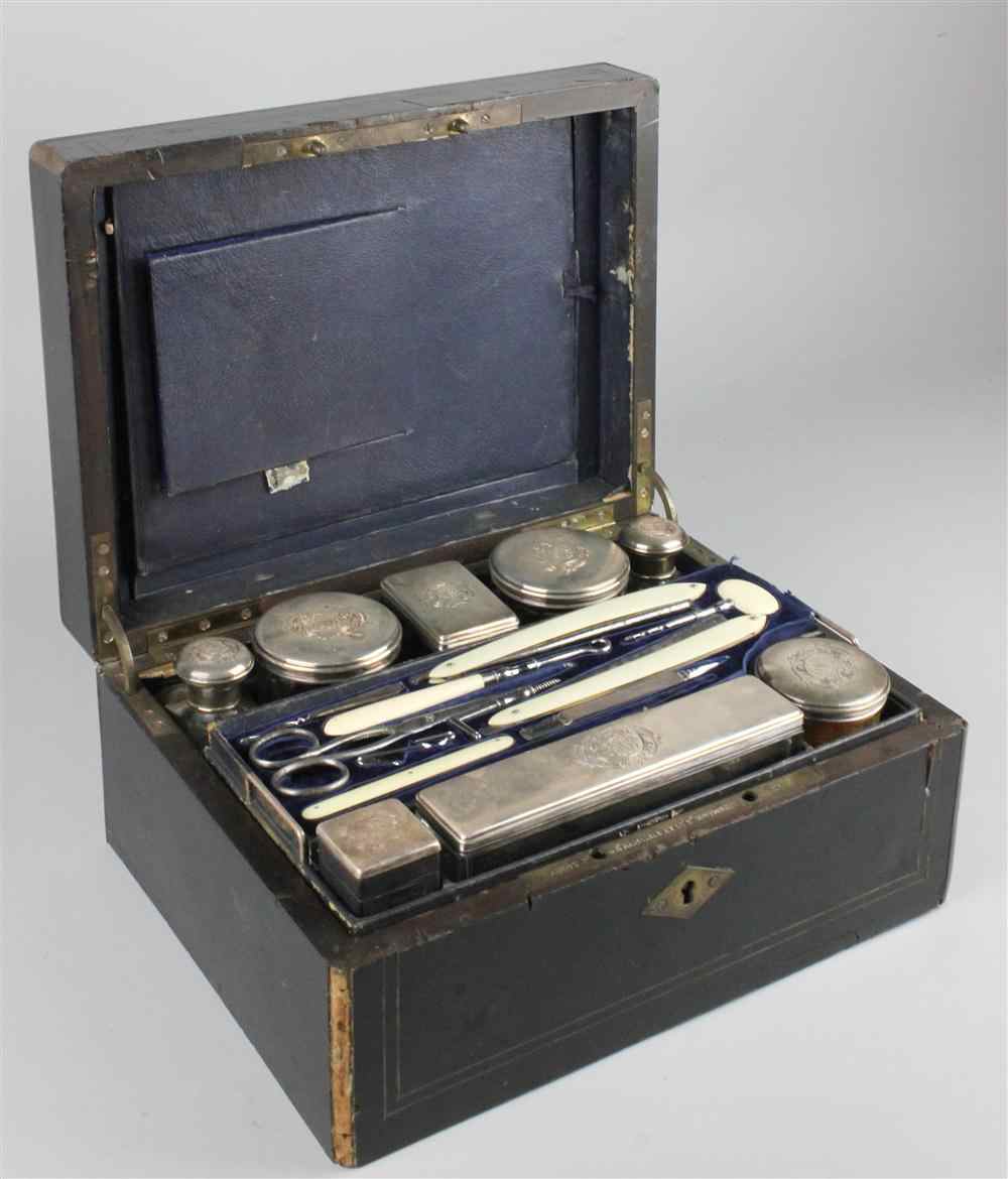 Appraisal: FRENCH SILVER AND IVORY NECESSAIRE in a brass-mounted fitted box