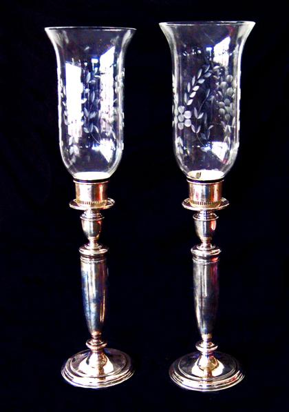 Appraisal: Pair of sterling silver weighted candlesticks with etched hurricanestowle silversmiths