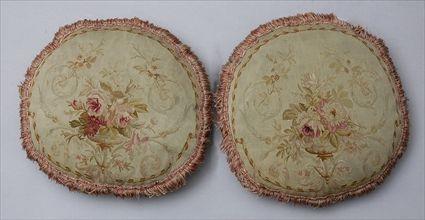 Appraisal: PAIR OF AUBUSSON TAPESTRY-COVERED PILLOWS Each circular oatmeal ground worked