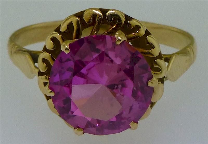 Appraisal: KT GOLD PINK SYNTHETIC SPINEL FASHION RING SZ One lady's