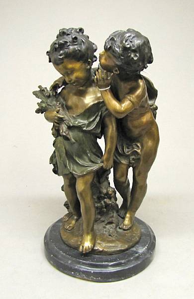 Appraisal: A patinated bronze figural group of two children after Auguste