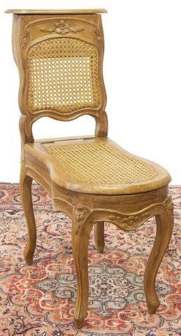 Appraisal: French Louis XV style commode chair th c hinged compartment