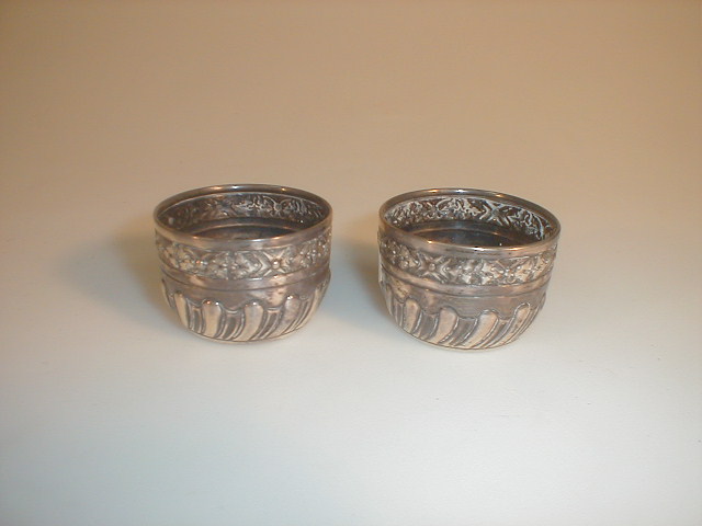 Appraisal: A pair of Victorian silver salts each embossed with a