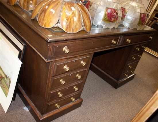 Appraisal: Edwardian oak partner's desk with inset tooled leather top Estimate