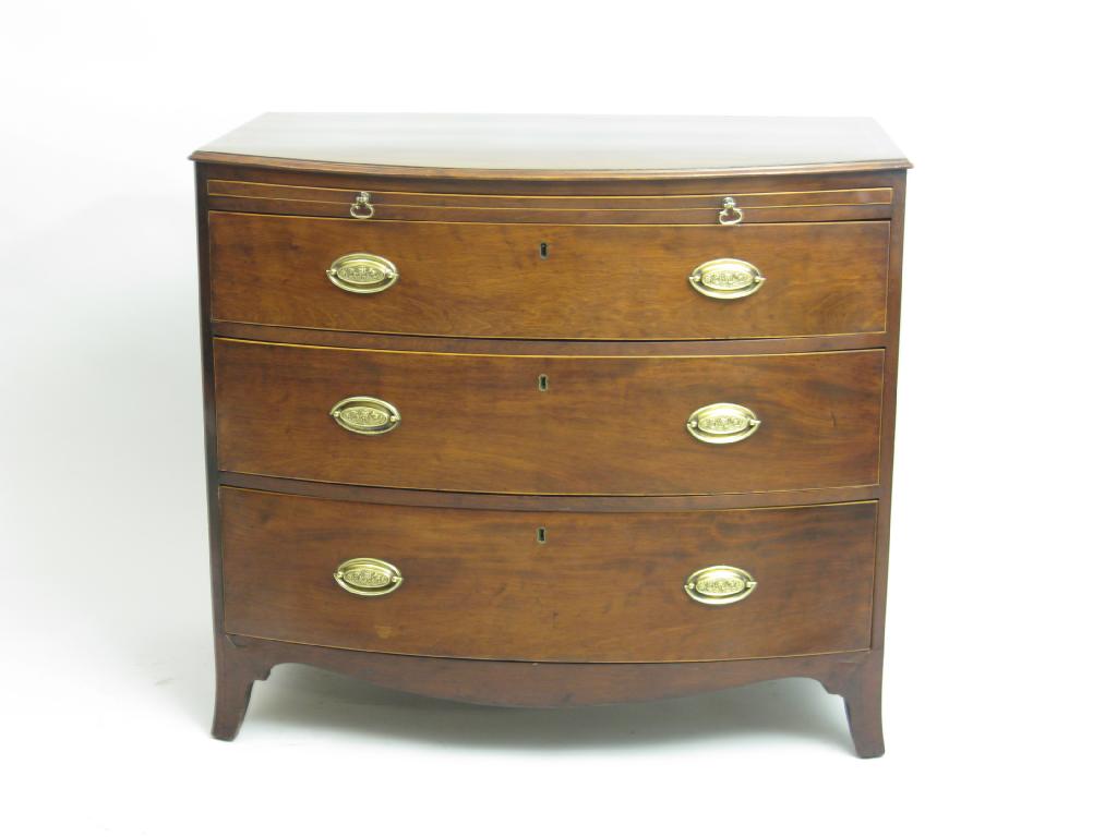 Appraisal: A th Century mahogany bow front Chest of three long