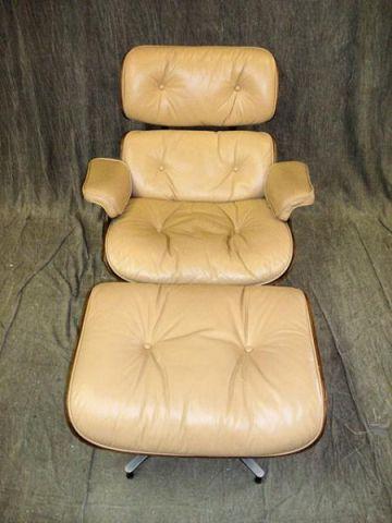 Appraisal: HERMAN MILLER Down-Filled and Rosewood Chair Ottoman by Charles Eames