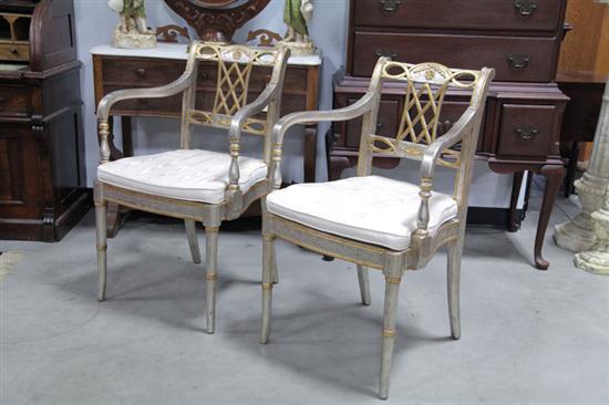 Appraisal: SIX MAITLAND-SMITH ARMCHAIRS Gold and silver armchairs with openwork splats