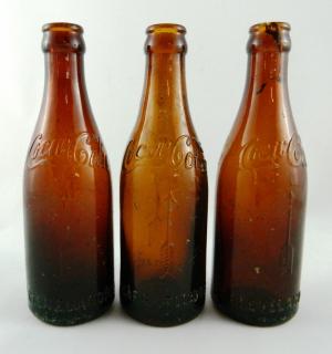 Appraisal: Coca Cola Arrow Amber bottles Soda- Coca Cola Arrow Amber