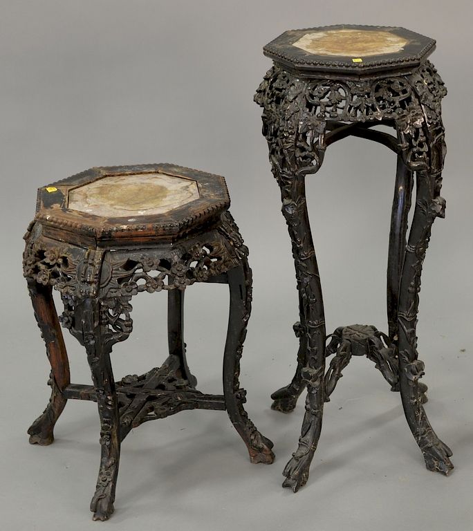 Appraisal: Two Chinese teak stands with inset marble tops ht in