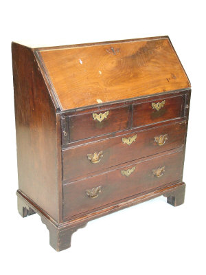 Appraisal: A George III mahogany bureau the fall front with fitted