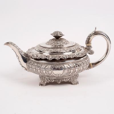 Appraisal: A George IV silver teapot Emes Barnard London of compressed