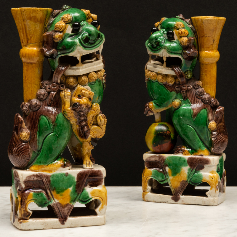 Appraisal: Pair of Chinese Sancai Glazed Porcelain Buddhistic Lions Unmarked x