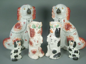 Appraisal: Pair of Staffordshire pottery models of Spaniels with iron red