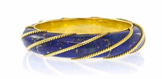 Appraisal: An Karat Yellow Gold and Lapis Lazuli Bangle Bracelet Piaget