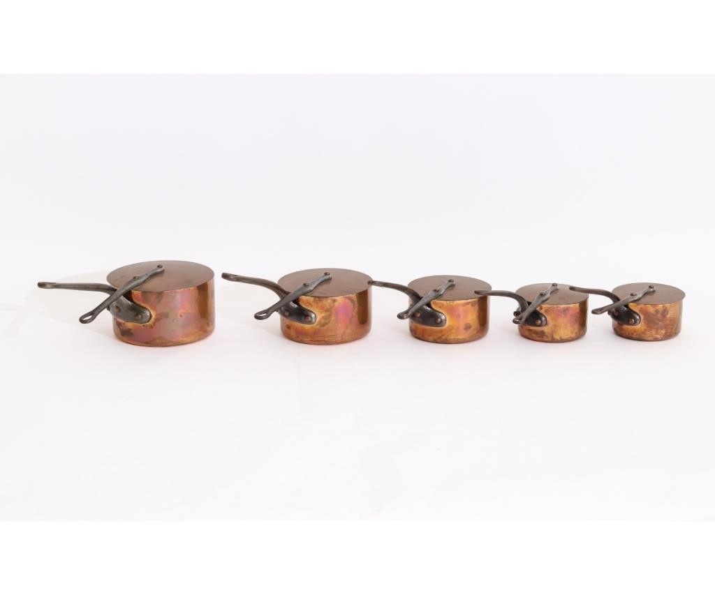 Appraisal: Five French copper iron cooking pots with covers mid th