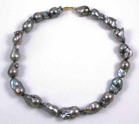 Appraisal: FRESHWATER BAROQUE PEARL NECKLACE strung with grey baroque pearls with