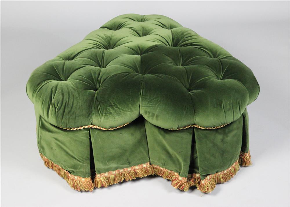 Appraisal: TUFTED GREEN VELVET TREFOIL OTTOMAN the conforming box pleated skirt