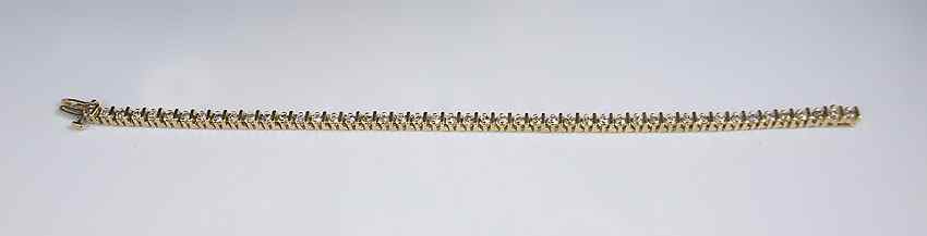 Appraisal: DIAMOND BAR STYLE TENNIS BRACELET K yellow gold bracelet contains