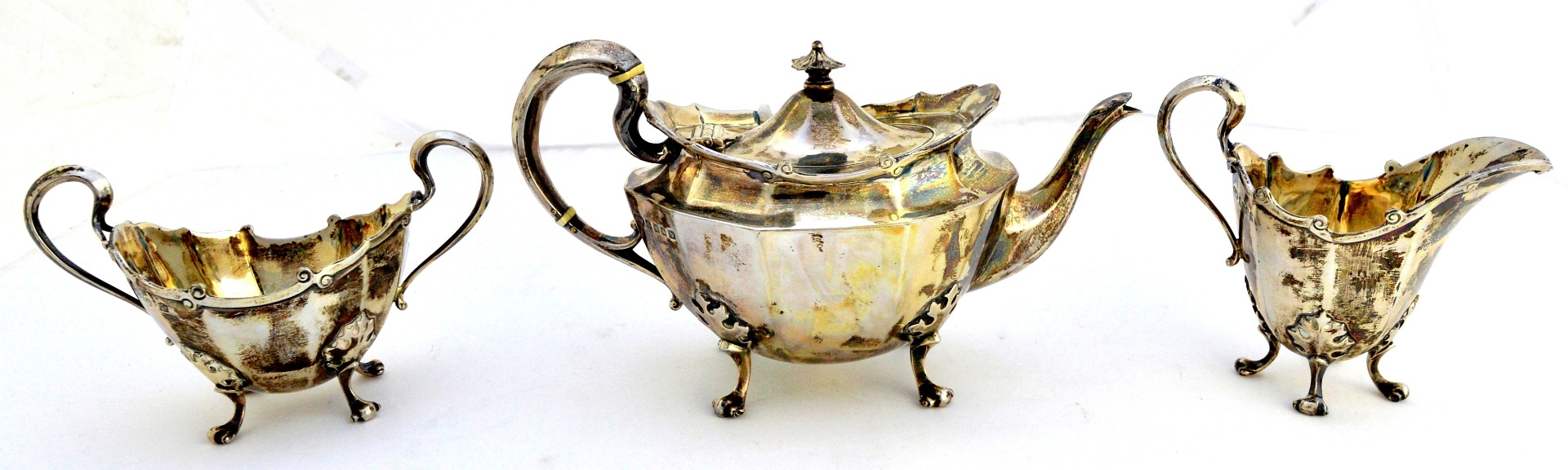 Appraisal: A Scottish silver three piece tea set comprising a teapot