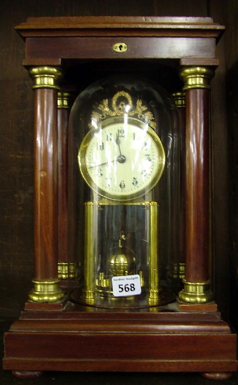 Appraisal: Gustav Becker Empire model torsion clock the back plate stamped