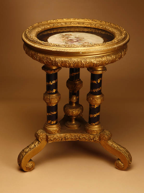 Appraisal: A Louis XVI style gilt and painted vitrine table centering