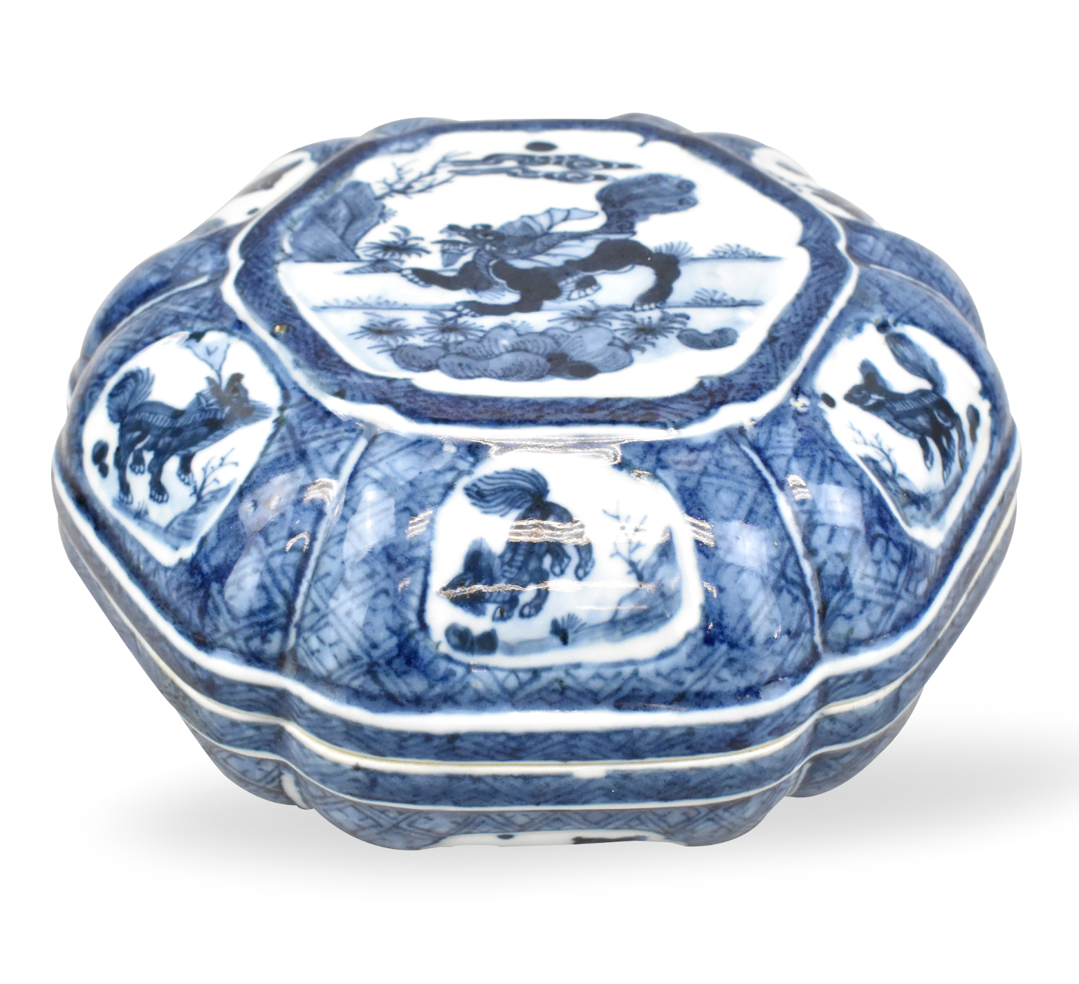 Appraisal: A blue white hexagonal box with kirin cover dating from