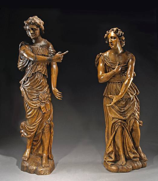 Appraisal: Two Baroque carved walnut angels th th century Each wearing