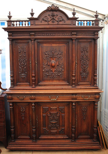 Appraisal: AN EARLY TH CENTURY CARVED WALNUT CABINET with a galleried