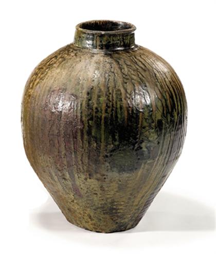 Appraisal: Chinese tea-dust type and mottled glaze stoneware wine jar probably