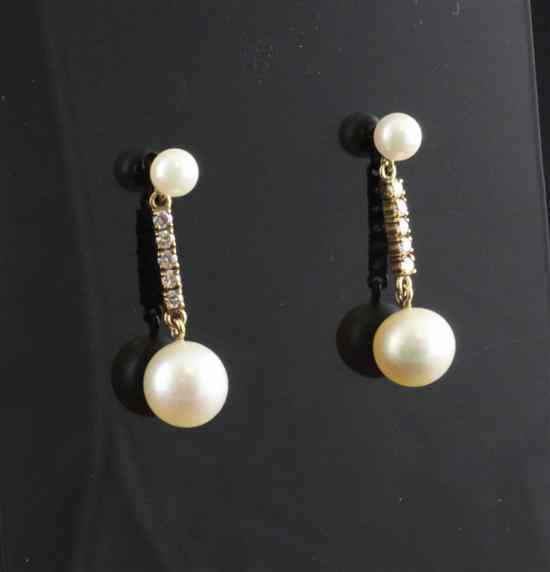 Appraisal: A pair of gold diamond and cultured pearl drop earrings